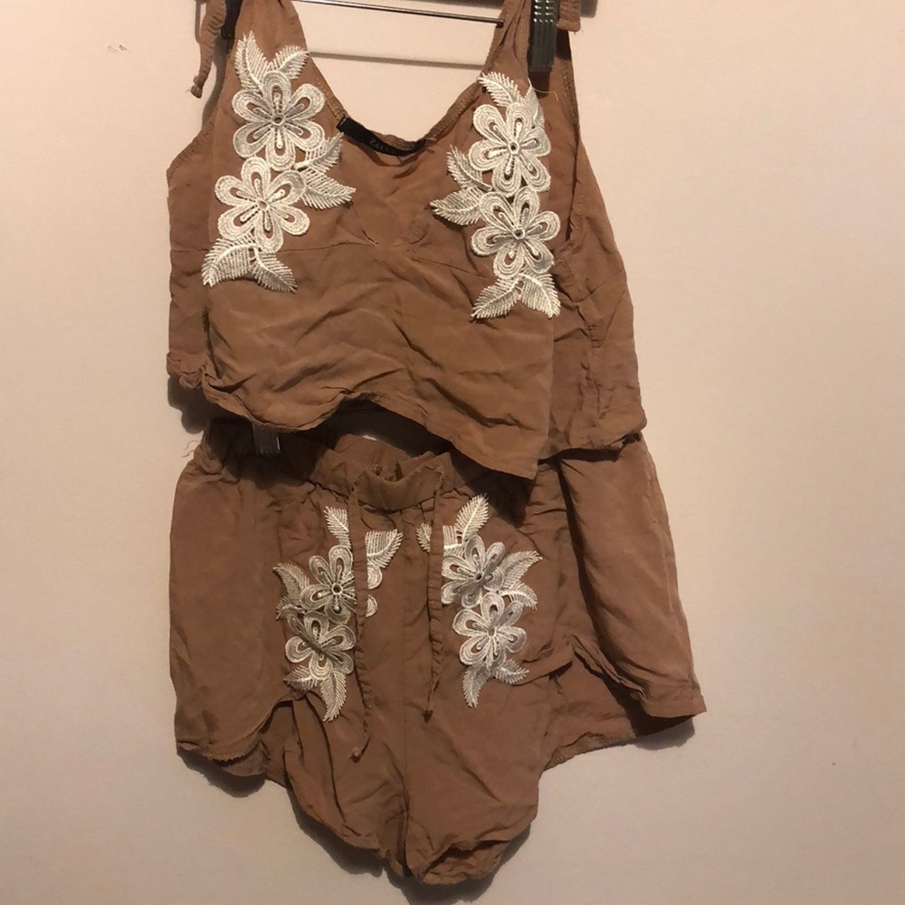 Two piece set of tan shorts and top